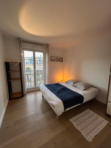 Postel nebo postele na pokoji v ubytování Disney 4 bedrooms 2 parkings 14 people 4 minutes from entrance of Disney