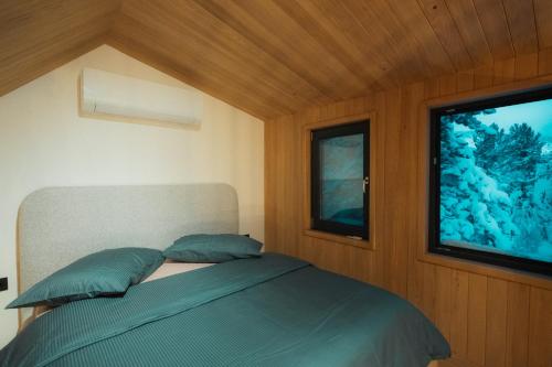 Postel nebo postele na pokoji v ubytování Nordic Escape Blidinje