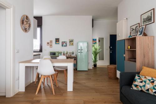 Appartamento con terrazzo sui tetti milanesi