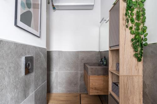 Appartamento con terrazzo sui tetti milanesi