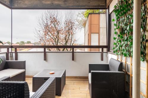 Appartamento con terrazzo sui tetti milanesi