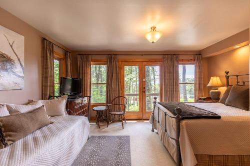 Giường trong phòng chung tại Altitudes Attitude