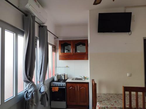 Η κουζίνα ή μικρή κουζίνα στο Noz Kaza Apartamentos