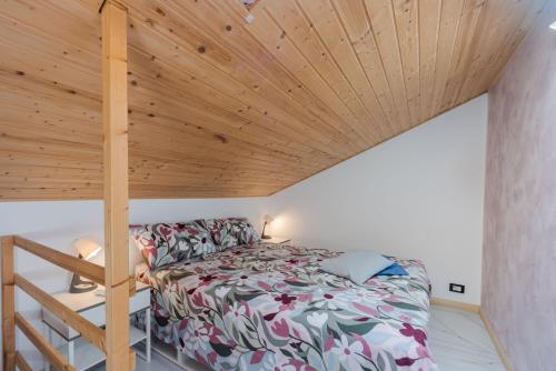 Postel nebo postele na pokoji v ubytování Casa Giusi Terrace & Charm by Wonderful Italy