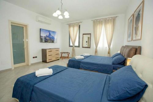 Ένα ή περισσότερα κρεβάτια σε δωμάτιο στο B&B Machiavelli