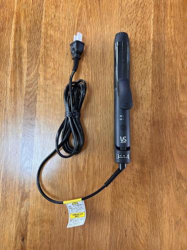 a wii remote with a cord on a table at 2025年12月OPEN! 豊橋民泊 最大13名様 駐車場2台無料 駅徒歩7分 Traditional Japanese house ,Toyohashi Aichi in Toyohashi