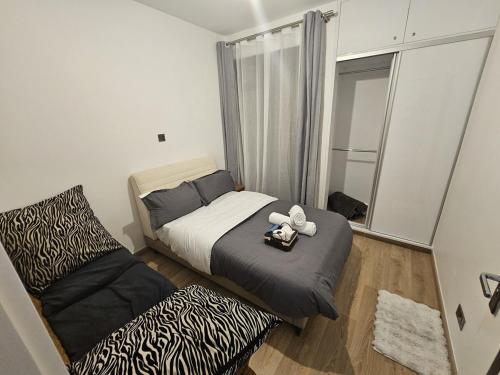 Ένα ή περισσότερα κρεβάτια σε δωμάτιο στο The Nook