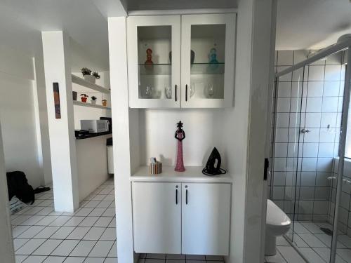 a bathroom with a sink and a toilet and a shower at Ametista 2 Beira Mar in Maceió
