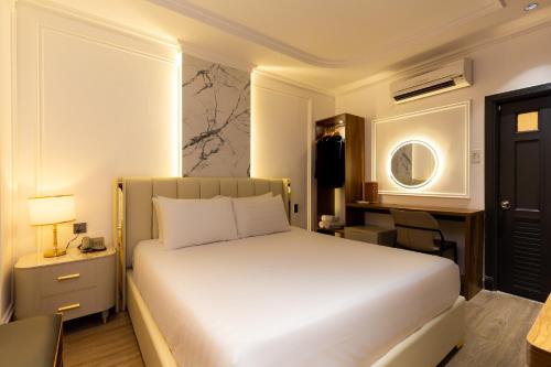 Ένα ή περισσότερα κρεβάτια σε δωμάτιο στο Luxury Eliana Hotel