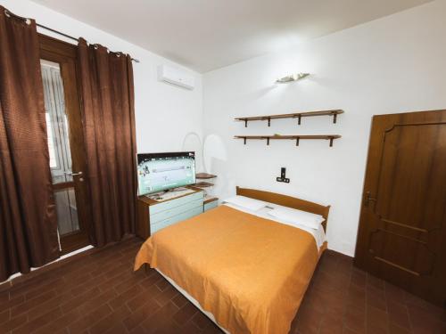 Ένα ή περισσότερα κρεβάτια σε δωμάτιο στο B&B Barone