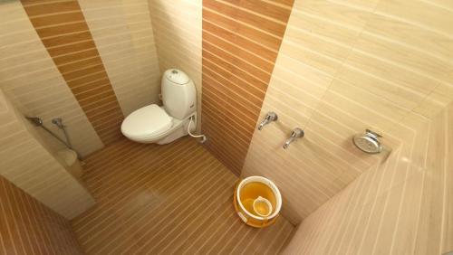 Koupelna v ubytování Rainbow Homestay Wayanad