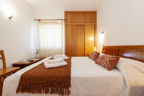 Postel nebo postele na pokoji v ubytování MarinaPark Hill Beach Apartment