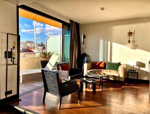 Posezení v ubytování Hôtel Cannes Centre Univers