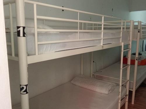 Μία ή περισσότερες κουκέτες σε δωμάτιο στο Welcome Hostel