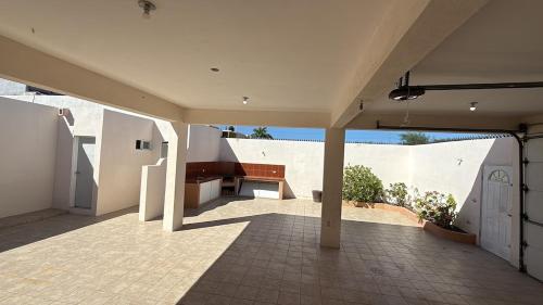 an empty house with a patio with a bench on it at Large house near Plaza Forjadores-Pet friendly in La Paz
