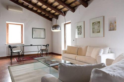 a living room with a couch and a table at Villa Vittoria in Citta' Sant'Angelo
