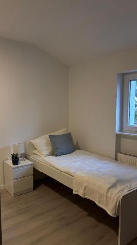 Una cama o camas en una habitación de Ferienwohung Nordwind