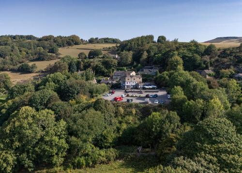 an aerial view of a house in the trees at The Millstone Country Inn in Hathersage