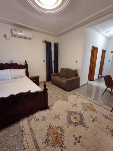 Giường trong phòng chung tại Shalom Residence