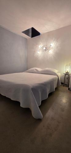 Ένα ή περισσότερα κρεβάτια σε δωμάτιο στο Maison Allauch La Gloire de mon Père