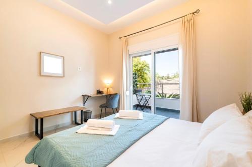 Ένα ή περισσότερα κρεβάτια σε δωμάτιο στο Acropolis Gem