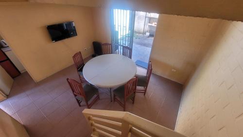 Μια τηλεόραση ή/και κέντρο ψυχαγωγίας στο Casa acogedora en calle principal de Talca