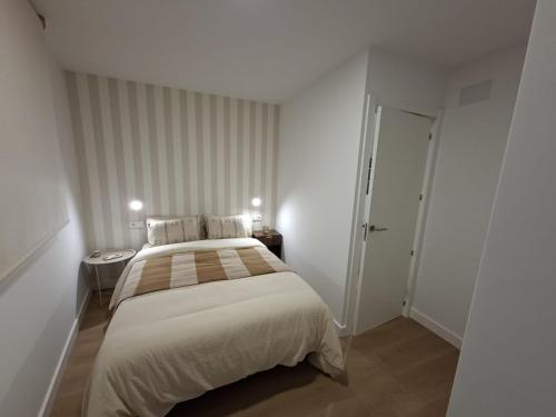 Ένα ή περισσότερα κρεβάτια σε δωμάτιο στο Casa Cuca O Grove