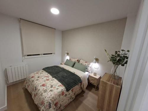 Ένα ή περισσότερα κρεβάτια σε δωμάτιο στο Casa Cuca O Grove