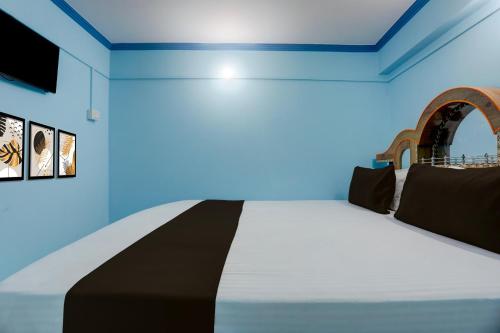 Postel nebo postele na pokoji v ubytování Hotel O Sawariya Guest House