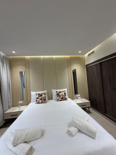 Ένα ή περισσότερα κρεβάτια σε δωμάτιο στο Apartment City Center Hilton Tanger