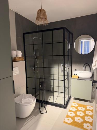 Koupelna v ubytování Andrra Apartment