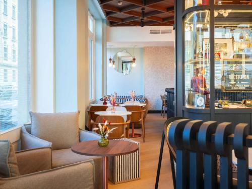 O zonă de relaxare la Grand Hotel des Brotteaux Lyon Ctre - Handwritten Collection