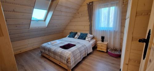 En eller flere senge i et værelse på Chata Przysłop