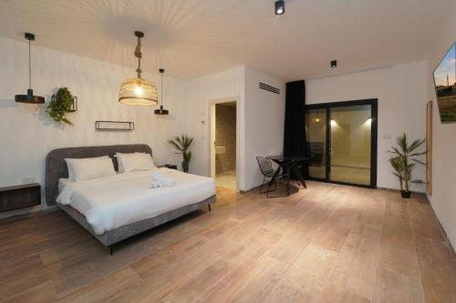 En eller flere senge i et værelse på וילה סירקל - Villa Circle