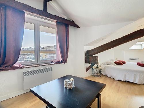 Ένα ή περισσότερα κρεβάτια σε δωμάτιο στο Le Duplex, 65m2, hyper-centre, 2 chambres, 6 pers