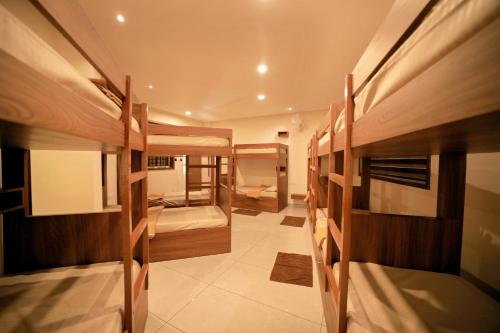 Voodi või voodid majutusasutuse LUMARISE Hotel toas