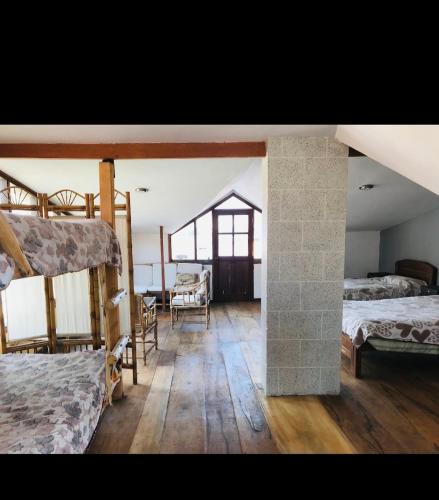 Ένα ή περισσότερα κρεβάτια σε δωμάτιο στο El Mirador ecológico