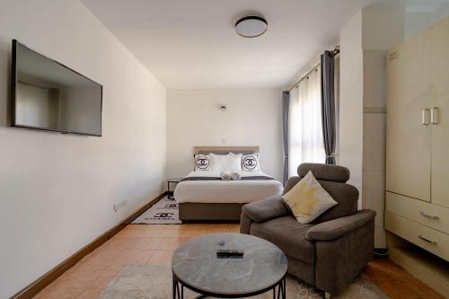 Ένα ή περισσότερα κρεβάτια σε δωμάτιο στο Emeli Luxury Suite