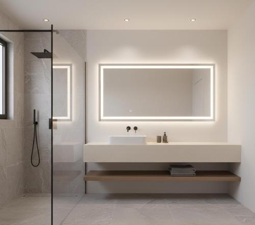 a bathroom with a white sink and a mirror at Özlem Apart&Pansiyon in Hatay