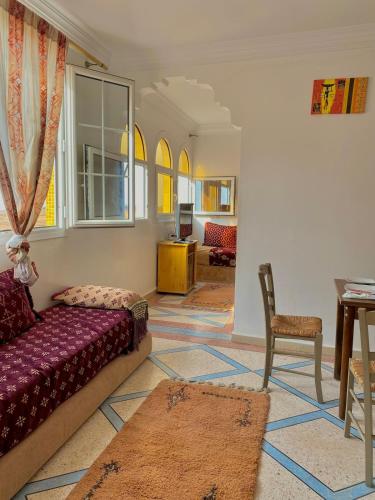 Postel nebo postele na pokoji v ubytování Cozy apartment with a sea view