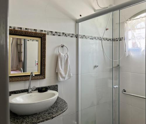 Et badeværelse på Village Itaúna Inn - Casas de Temporada