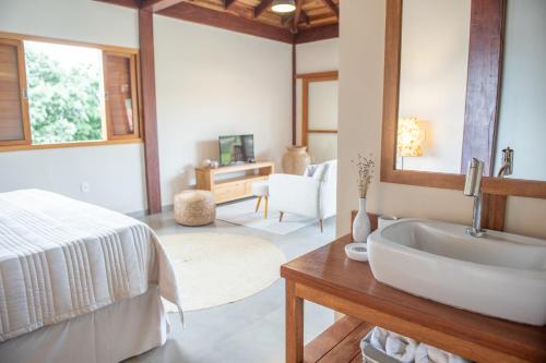 Ένα ή περισσότερα κρεβάτια σε δωμάτιο στο Casas Gengibre