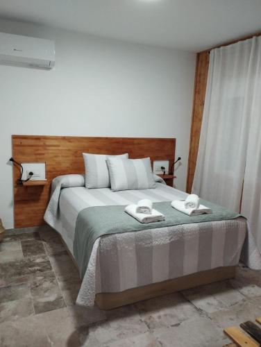Postel nebo postele na pokoji v ubytování Casa Rural Las Matillas