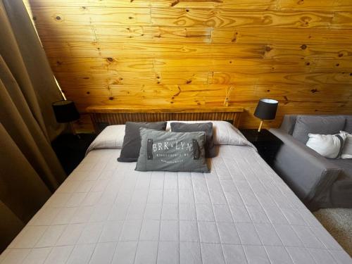 Giường trong phòng chung tại Tiny House Pool