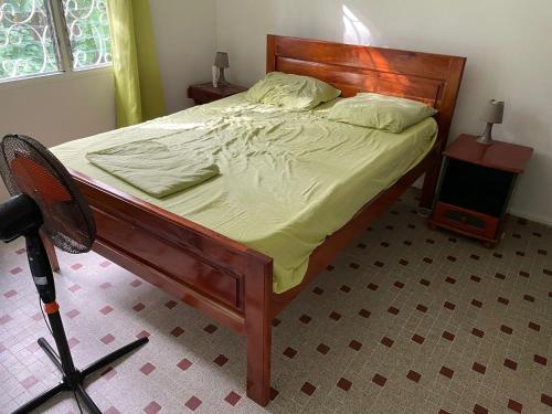 En eller flere senge i et værelse på Haut de maison à Deshaies proche de Grande Anse