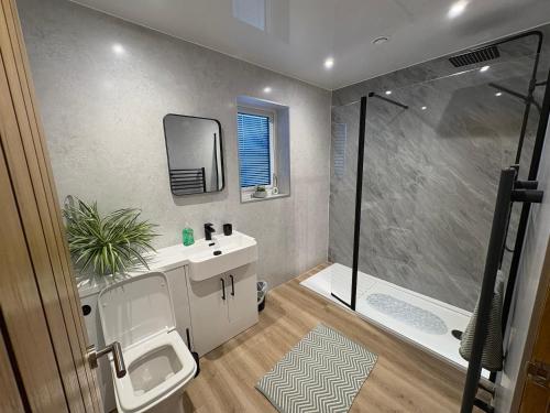 Ένα μπάνιο στο Woodway Lodge