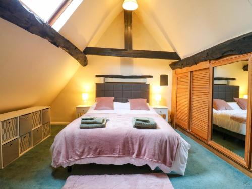 Ένα ή περισσότερα κρεβάτια σε δωμάτιο στο Clare's Cottage