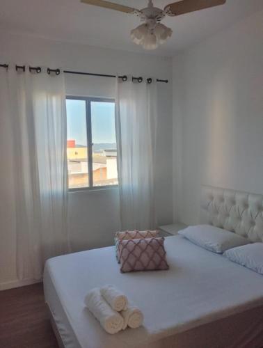 Afbeelding uit fotogalerij van Apartamento aconchegante em São José - a 15min do centro de Florianópolis in São José