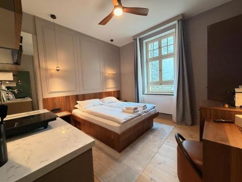 Ένα ή περισσότερα κρεβάτια σε δωμάτιο στο Amaroo - Apartments "Regia"