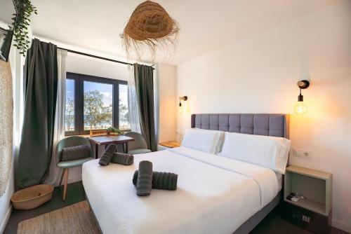 Postel nebo postele na pokoji v ubytování El Mirador